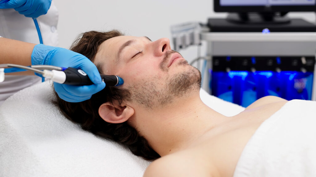 Client receiving a Hydrafacial treatment